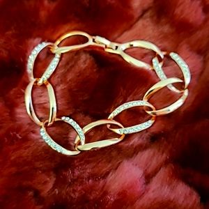 Rose gold chain link bracelet.